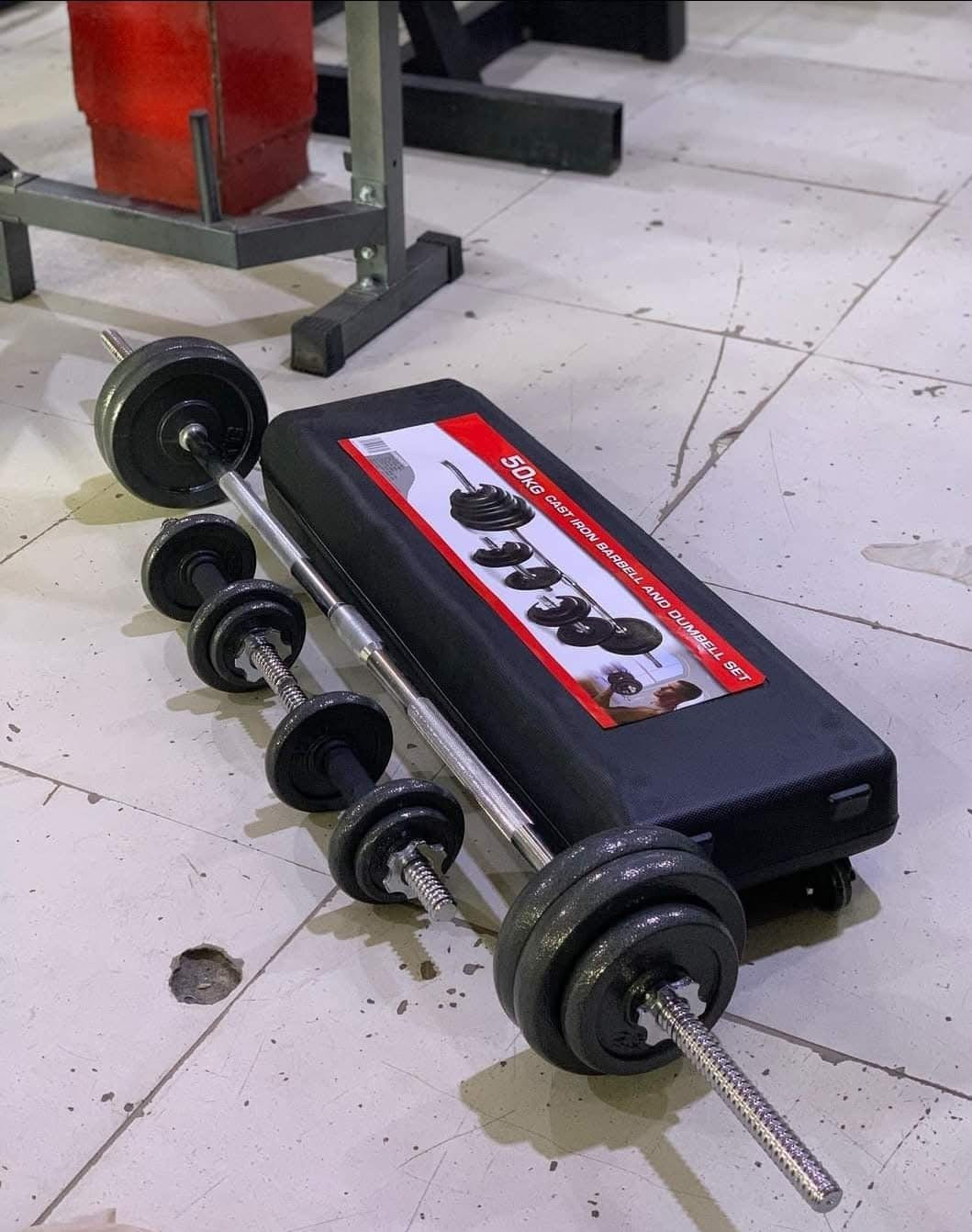 50KG CAST IRON DUMBBELLS SET.